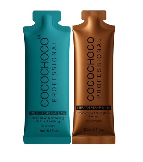 Due pacchetti di maschere per capelli Cocochoco Professional, uno blu e uno marrone, su sfondo bianco.
